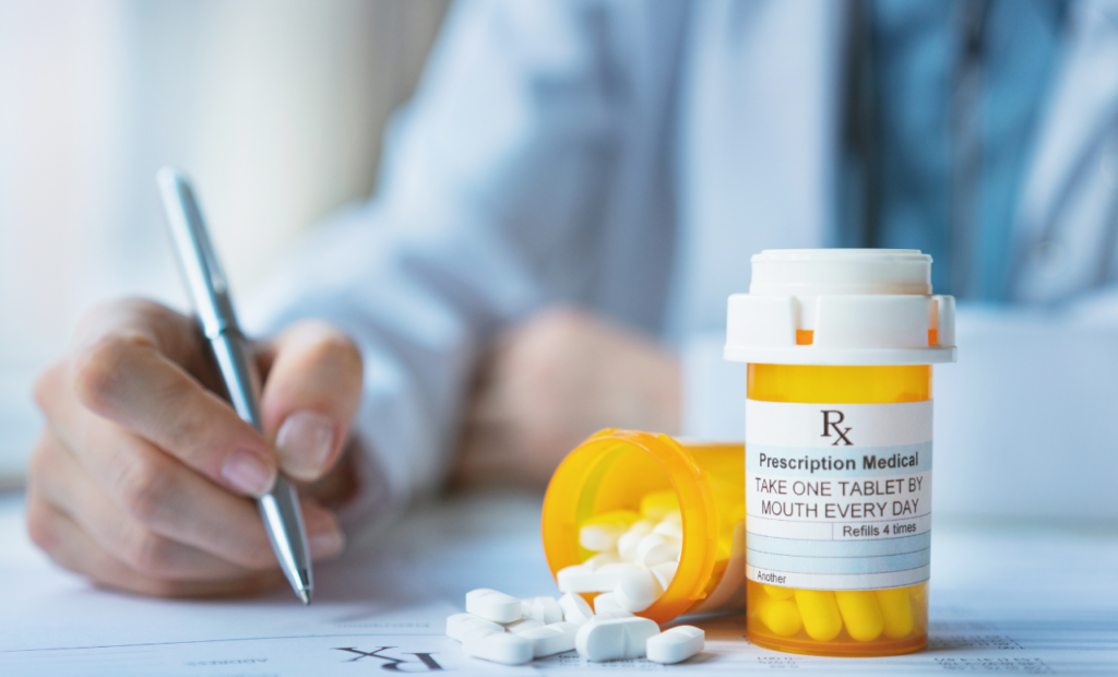 Dangerous drug and medical device attorney in Arizona representing prescription injury cases with a doctor writing a prescription and medicine bottle