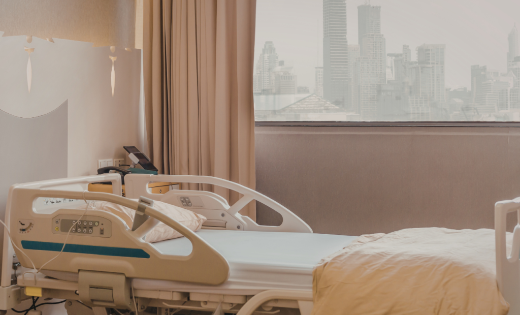 Catastrophic injury lawyer in Arizona representing severe injury claims shown with an empty hospital bed in a medical facility