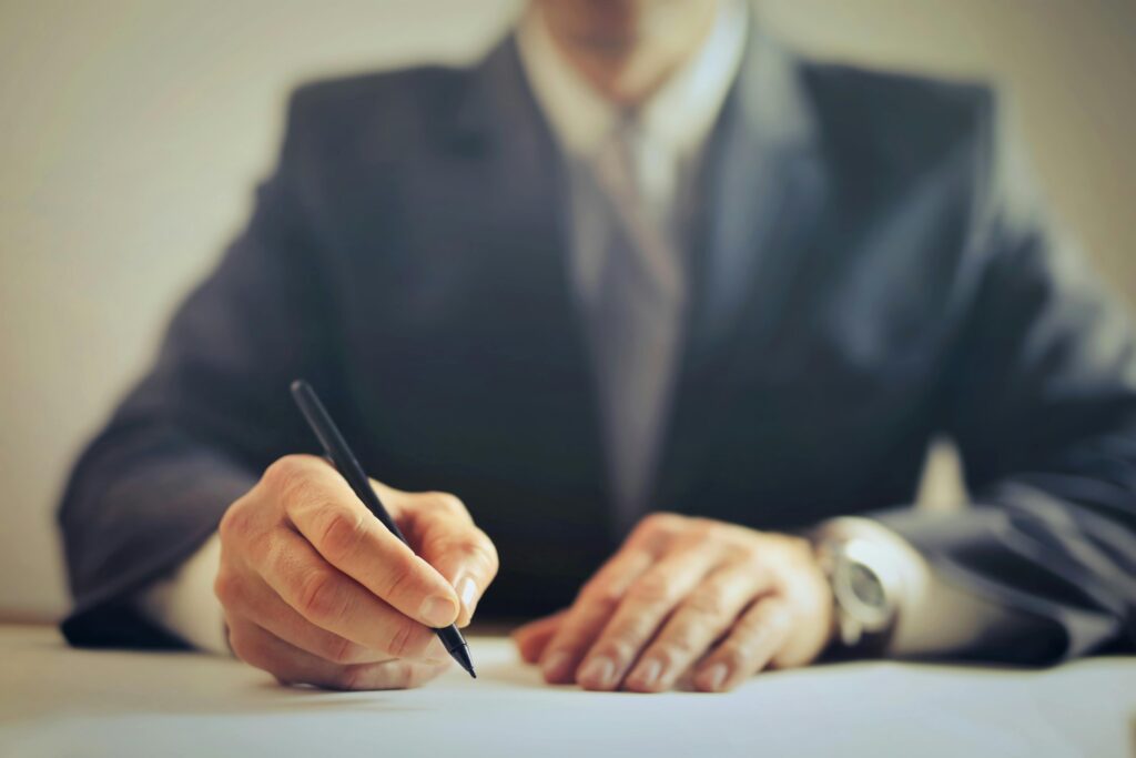 Breach of contract lawyer in Arizona handling contract disputes with a person signing a legal agreement